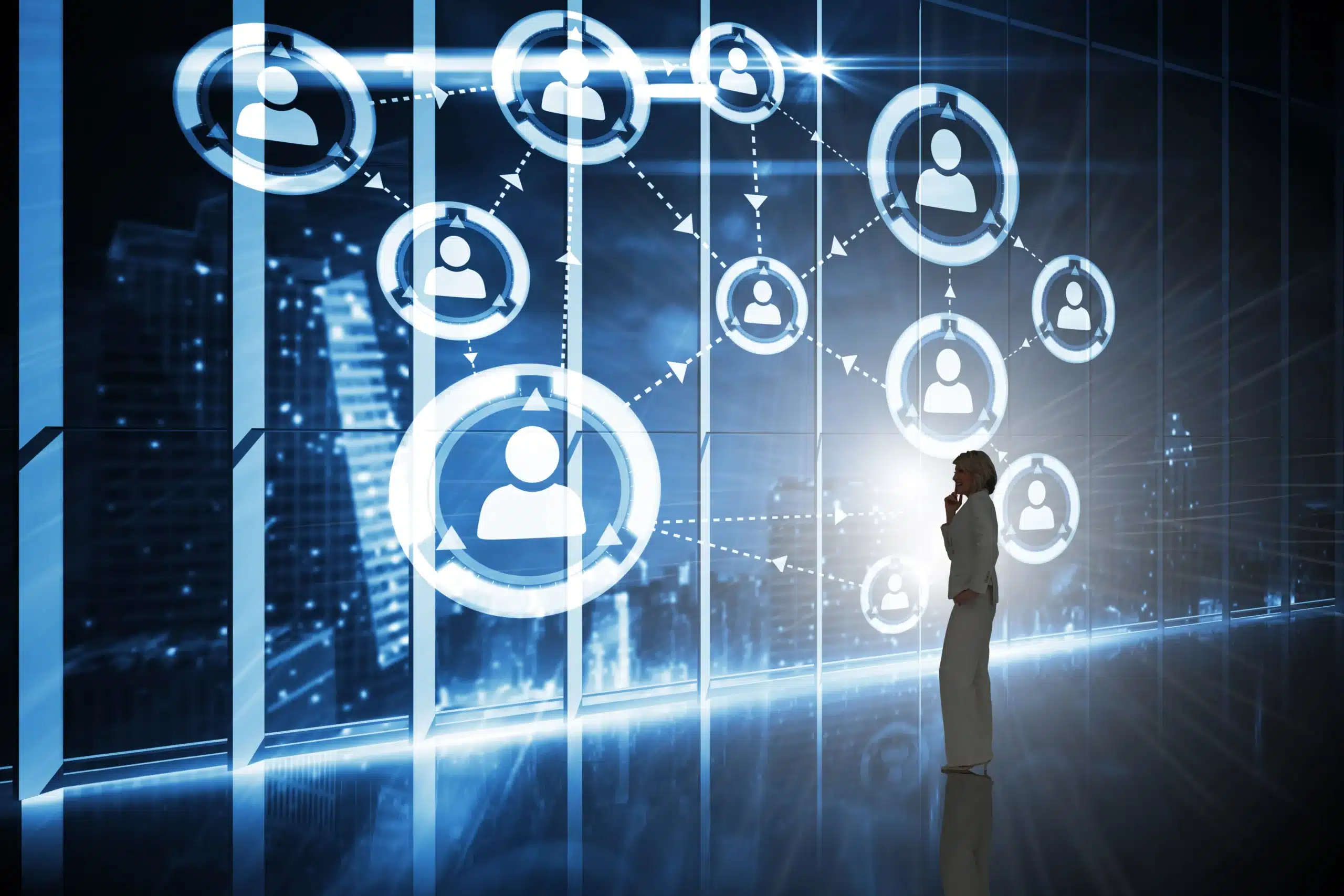 823410776 businesswoman thinking against hologram interface office overlooking city scaled